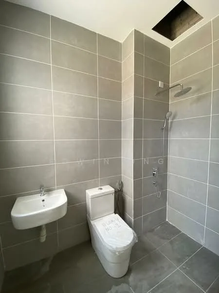 Bathroom features: grey ceramic tile walls, grey ceramic tile flooring, single-sink vanity, one-piece toilet, handheld shower, wall-mounted shower head, exposed plumbing, window opening for natural light; style: modern.