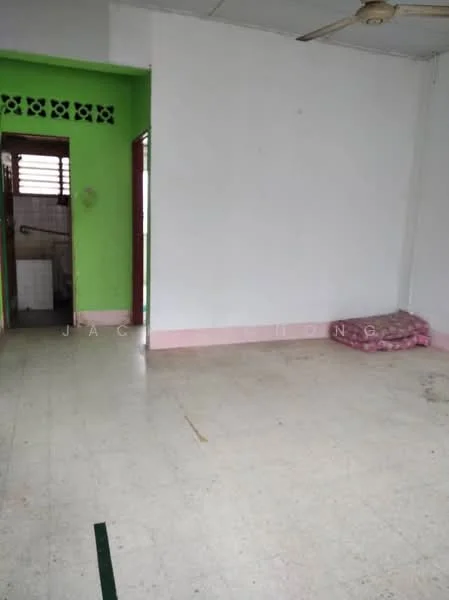 Room features: white painted walls, green accent wall, vinyl flooring, ceiling fan, doorway leading to another room, unfurnished space, natural light from windows, pink skirting.