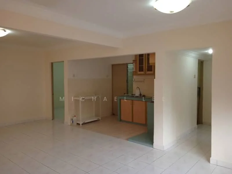 Kitchen features: white painted walls, ceramic tile flooring, single-bowl stainless-steel sink, built-in cabinetry in light wood, countertop in green, kitchen island, wall-mounted shelves, window above sink. Living features: white painted walls, ceramic tile flooring, ceiling light fixture, open layout, doorway to kitchen, doorway to hallway.