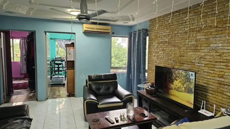 Living features: black leather sofa with yellow accents, wooden coffee table, wall-mounted TV, exposed brick accent wall, white tiled flooring, 5-blade ceiling fan with light, large window with view of greenery, decorative wall lights; style: modern; view: garden. Room features: blue painted walls, air conditioning unit, curtains, doorway leading to another room.