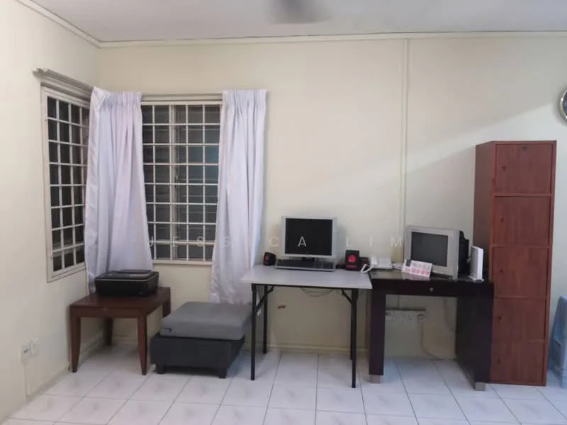 Room features: white painted walls, tile flooring, two windows with white curtains, wooden desk, computer monitor, printer, grey ottoman, wooden cabinet, second computer monitor; style: minimalist.