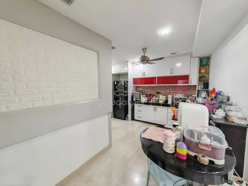 Kitchen features: white painted walls, red accent wall, marble tile flooring, ceiling fan with light, kitchen cabinets with glossy finish, countertop with space for appliances, stainless-steel sink, built-in oven, freestanding range oven, microwave, refrigerator, kitchen island with seating, various kitchen utensils and containers visible, open shelving, decorative wall panel; style: modern.