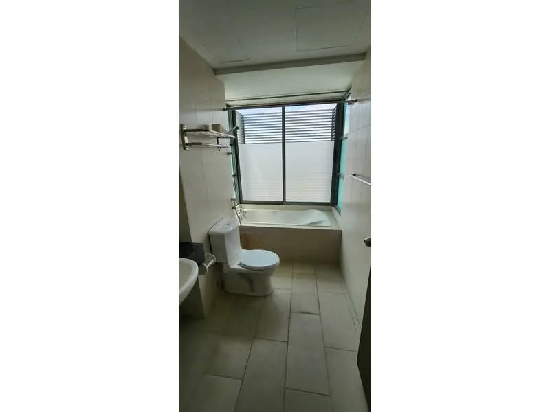 Bathroom features: bathtub, toilet, single-sink vanity, mirror, tiled walls, tile flooring, window with blinds, wall-mounted towel rack; style: modern.