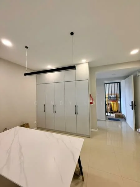Room features: white painted walls, marble dining table, tile flooring, built-in cabinetry with multiple doors, recessed downlights, pendant light fixture, open doorway leading to hallway; style: modern.