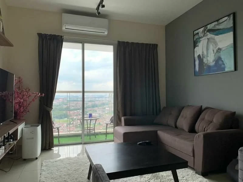 Living features: L-shape sectional sofa in brown, coffee table, wall-mounted TV, TV console, floor-to-ceiling windows, sliding glass door, sheer curtains, recessed downlights, air conditioning unit, area rug with plush texture, decorative wall art, greenery in vase; style: modern; view: city.