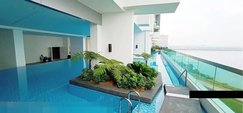 Exterior type: high-rise condominium; features: infinity pool, pool deck with loungers, landscaped garden area, glass railing, water feature, tiled flooring, surrounding greenery; style: modern.