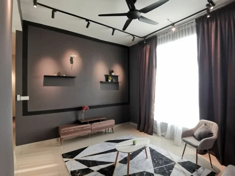 Living features: dark grey accent wall, white painted walls, floor-to-ceiling windows with sheer curtains, 3-blade ceiling fan, track lighting, wooden TV console, decorative shelves on wall, area rug with geometric pattern, coffee table, upholstered armchair; style: modern.