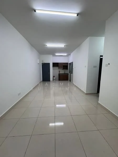Room features: white painted walls, glossy ceramic tile flooring, recessed LED downlights, open layout, kitchen area visible in background, grey cabinetry in kitchen, stainless-steel fridge, built-in oven, single-bowl stainless-steel sink, countertop, wall-mounted kitchen cabinets, doorway leading to another room, no visible furniture; style: modern.