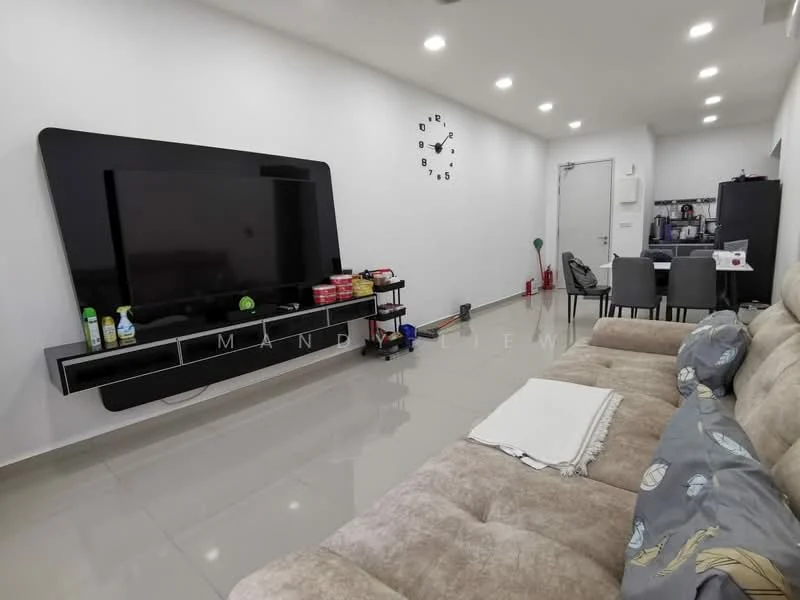 Living features: light grey fabric sofa, black wall-mounted TV unit, large flat-screen TV, white walls, glossy beige tile flooring, clock on wall, black shelving unit, cleaning supplies visible, area rug, dining table with chairs; style: modern.