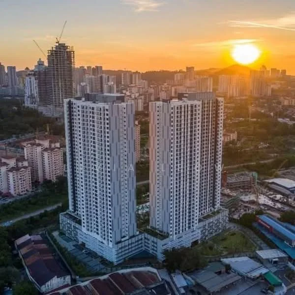 Exterior type: high-rise condominium; features: glass curtain wall, white painted facade, recessed balconies, surrounded by mature greenery, approximately 20-storey high-rise, sunset view, urban context with city skyline in background; style: modern.