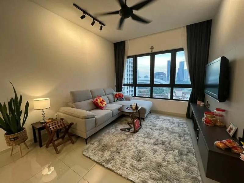 Living features: 3-seater fabric sofa in light grey, ceiling fan with light, floor-to-ceiling windows, city skyline view, light-coloured walls, polished tile flooring, area rug with plush texture, TV console, wall-mounted TV, decorative plant in pot, side table with lamp, snack items on console; style: modern; view: city.