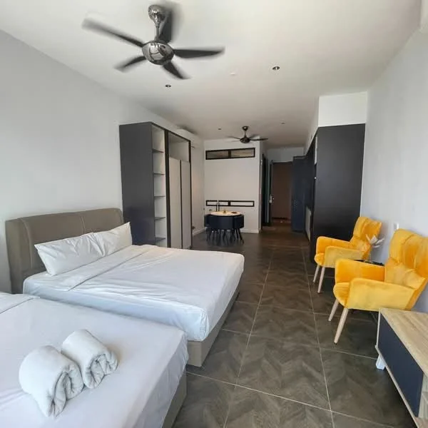 Bedroom features: two single beds with white bedding, upholstered headboard in beige, yellow accent chairs, round dining table, ceiling fan with light, built-in wardrobe with sliding doors, grey walls, tile flooring, decorative wall-mounted mirror; style: modern.