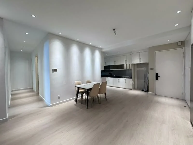 Living features: light wood flooring, white painted walls, recessed downlights, open-plan layout, dining table for four, four beige dining chairs, kitchen cabinetry with upper and lower storage, stainless-steel appliances, large kitchen countertop, neutral color palette; style: modern.
