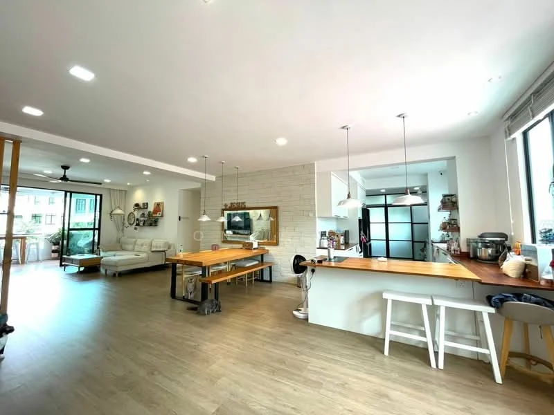 Living features: light wood flooring, floor-to-ceiling windows, white painted walls, recessed LED downlights, 3-blade ceiling fan, L-shape sectional sofa in white, wooden dining table with benches, open kitchen layout, kitchen island with bar stools, decorative mirror, wall-mounted TV, houseplants in ceramic pots; style: modern; view: garden. Kitchen features: white cabinetry, stainless-steel appliances, single-bowl stainless-steel sink, chrome pull-down faucet, quartz countertop, backsplash with tile cladding, built-in oven, freestanding range oven, microwave, kitchen island with breakfast bar; style: modern.