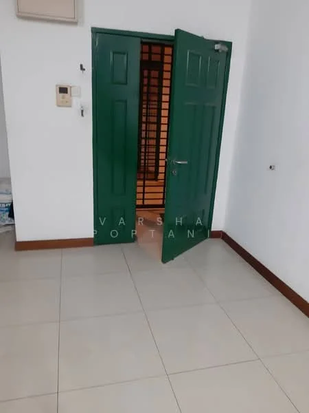 Room features: green double door, white painted walls, tile flooring, light switch, door frame, door handle, visible entrance, baseboard.