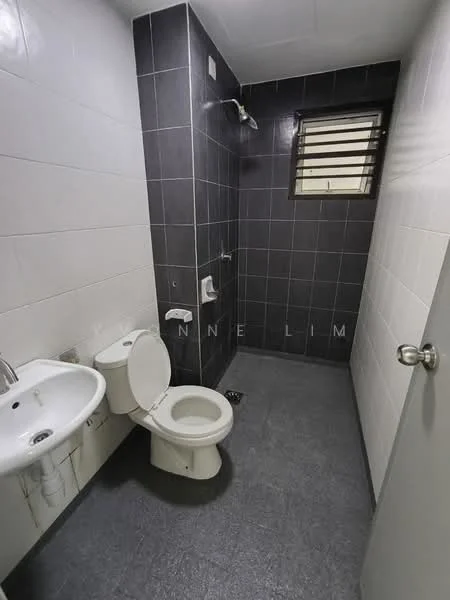 Bathroom features: white ceramic toilet, single-sink vanity with chrome faucet, grey ceramic tile flooring, grey wall tiles, white wall tiles, shower area with wall-mounted shower head, window with horizontal slats, toilet paper holder, towel rack; style: modern.