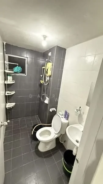 Bathroom features: grey tiled walls, white tiled walls, black tiled flooring, shower area with glass partition, wall-mounted shower head, toilet, sink with faucet, shelf units, ceiling light; style: modern.