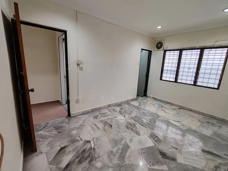 Room features: marble flooring, white painted walls, ceiling lights, two windows with grid pattern, wooden door, doorway leading to another room, corner wall with electrical outlet, air conditioning unit.