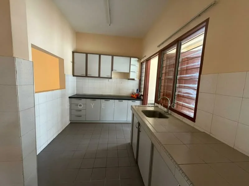 Kitchen features: grey cabinetry, black countertop, double-bowl stainless-steel sink, chrome faucet, white tiled walls, grey tiled flooring, window with wooden shutters, open shelving, built-in cabinets.
