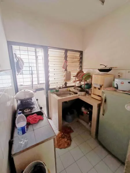 Kitchen features: white tiled walls, light grey tiled flooring, single-bowl stainless-steel sink, chrome pull-down faucet, built-in gas stove, freestanding fridge, kitchen countertop, open shelving, window with horizontal slats, various kitchen utensils, water bottle, dish rack.