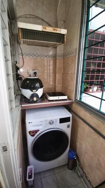 Laundry features: front-load washing machine, air fryer, countertop, tile flooring, beige tiled walls, window with metal grille, exhaust fan, plumbing fixtures, storage shelf.