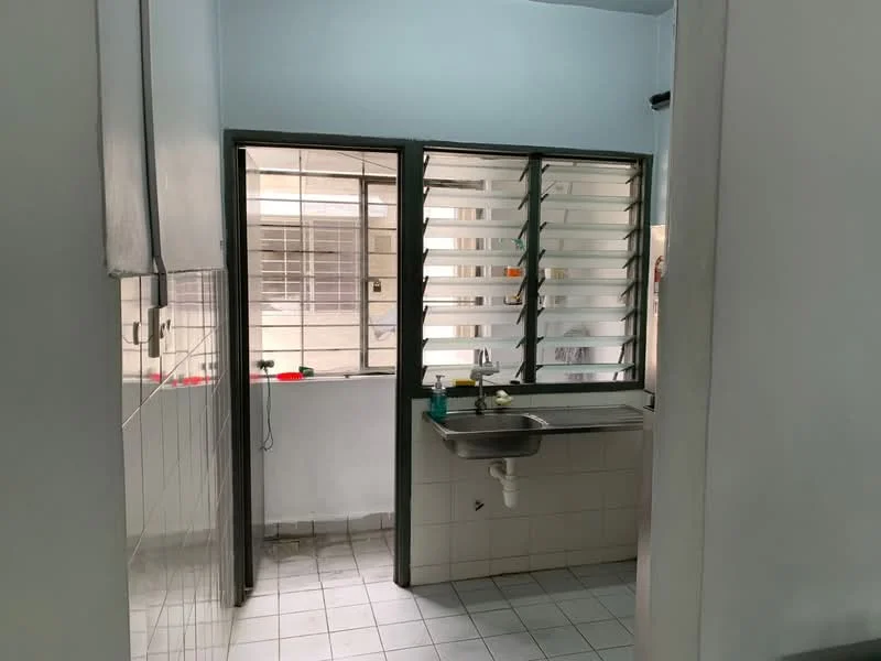 Kitchen features: single-bowl stainless-steel sink, chrome faucet, green countertop, white tiled backsplash, white tiled walls, grey tiled flooring, louvered windows, wall-mounted cabinets, open layout, natural light from windows.