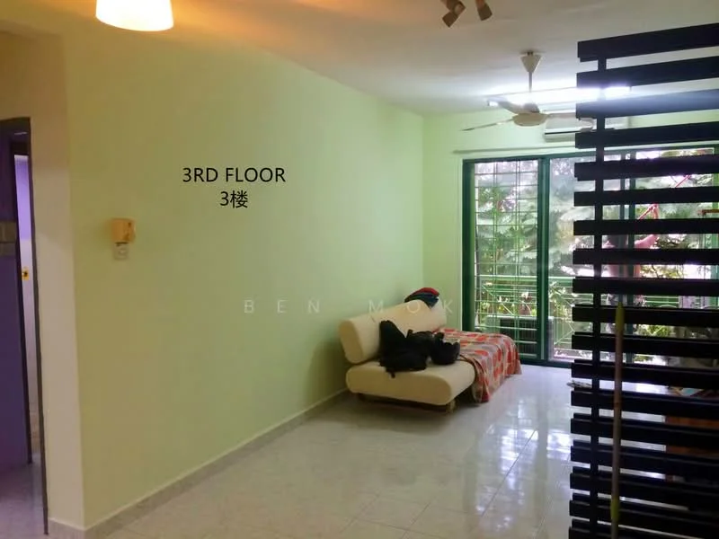 Living features: light green painted walls, white ceiling, ceiling fan, sliding glass door, floor-to-ceiling windows, white tiled flooring, sofa with patterned throw, decorative throw pillows, indoor plants visible outside, natural light from windows; style: modern; view: garden.