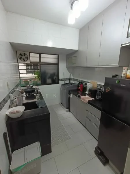 Kitchen features: grey cabinetry, black granite countertop, single-bowl stainless-steel sink, chrome pull-down faucet, built-in oven, freestanding range oven, stainless-steel fridge, ceramic tile flooring, white painted walls, window with view of greenery, exhaust fan, kitchen mat; style: modern; view: garden.