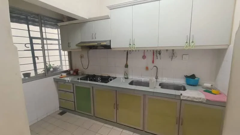 Kitchen features: white cabinetry with green accents, stainless-steel range hood, double-bowl stainless-steel sink, chrome pull-down faucet, ceramic tile backsplash, countertop with grey surface, built-in gas hob, window with metal grille, floor tiles in light color, hanging utensils, kitchen accessories on countertop, potted plants on windowsill; style: modern.
