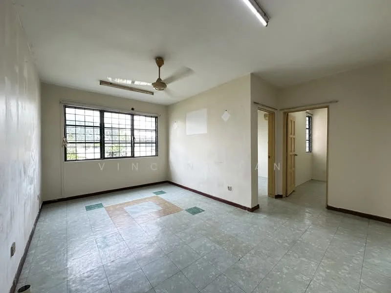 Room features: white painted walls, green ceramic tile flooring, ceiling fan, large windows with grid pattern, light fixture on ceiling, doorway leading to another room, corner of room with different tile pattern, no visible furniture.