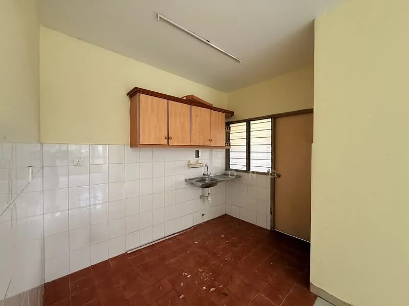 Kitchen features: wooden cabinetry, single-bowl stainless-steel sink, wall-mounted faucet, white tiled walls, red ceramic tile flooring, window with metal grille, door to outside, fluorescent ceiling light.