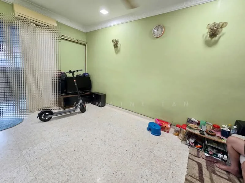 Room features: cream painted walls, marble flooring, ceiling fan, sliding glass door, open shelving, decorative wall lights, scooter, pet food bowl, storage boxes, area rug.