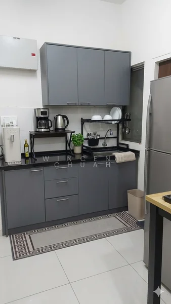 Kitchen features: grey cabinetry, stainless-steel fridge, built-in coffee machine, kettle, black countertop, white backsplash, sink with faucet, dish rack, decorative plant, area rug with geometric pattern, wall-mounted air conditioning unit, window with view; style: modern.