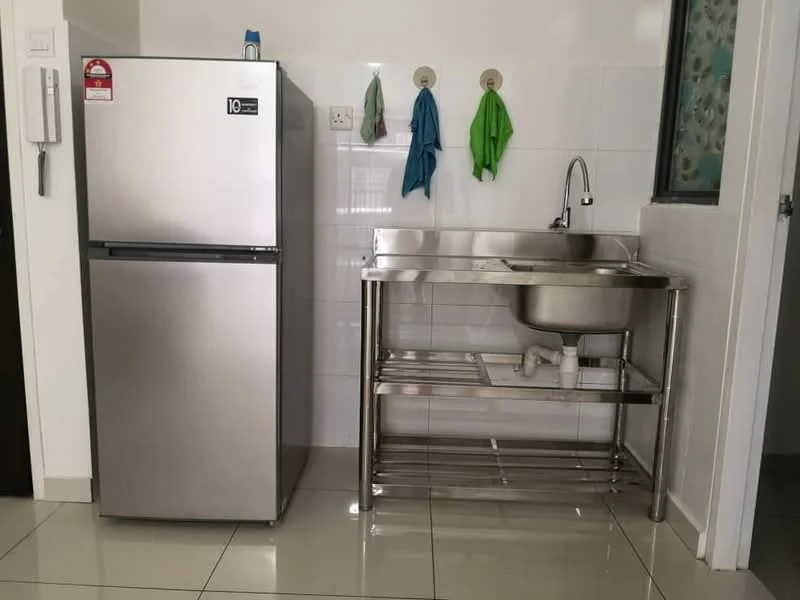 Kitchen features: stainless-steel sink, chrome faucet, stainless-steel work table, double-door fridge, green kitchen towels, white tiled walls, glossy floor tiles, wall-mounted kitchen accessories; style: modern.