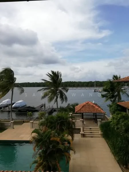 Exterior type: detached bungalow; features: swimming pool, manicured lawn, palm trees, waterfront view, outdoor deck, boat dock, terracotta roof, landscape garden, patio area; style: tropical-modern.