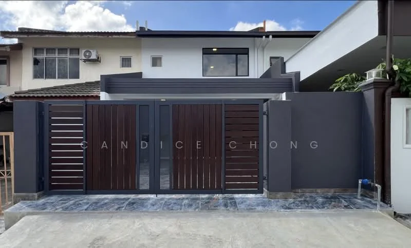 Exterior type: linked terrace house; features: dark wooden gate, grey painted facade, stone-paved driveway, white walls, flat roof, manicured landscaping, air conditioning unit visible, modern design elements; style: modern.