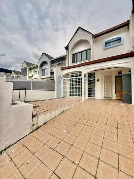 Exterior type: linked terrace house; features: white painted facade, tiled flooring, gated entrance, front porch area, two-storey structure, large windows, balcony on upper floor, manicured landscaping, surrounded by neighboring houses, sliding glass door, security grille; style: modern.