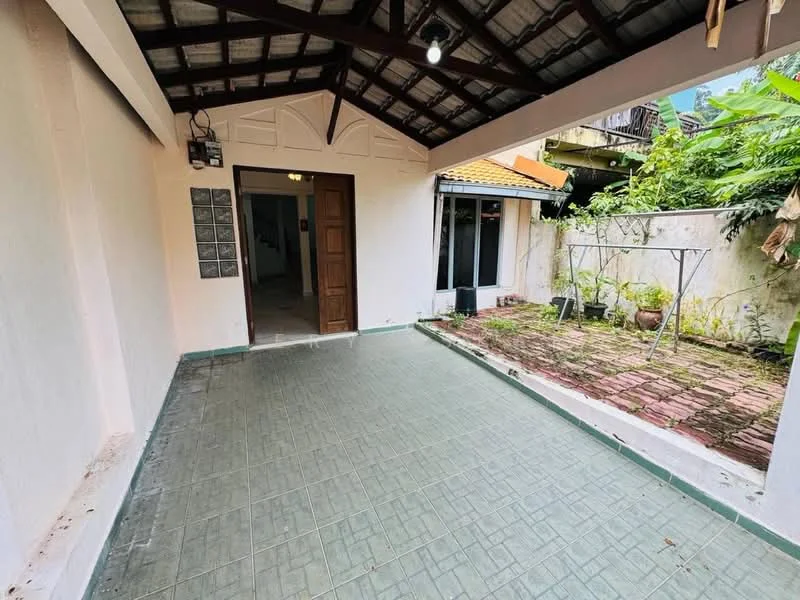 Room features: exposed beam ceiling, tiled flooring in green, white painted walls, door leading to exterior, sliding glass door, outdoor garden view, brick pathway, laundry area with drying rack; style: modern; view: garden.