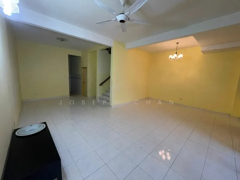 Living features: yellow painted walls, white ceiling, 5-blade ceiling fan, chandelier, ceramic tile flooring, staircase in background, large windows, open layout; style: modern.