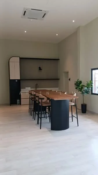 Kitchen features: island kitchen with bar seating, black countertop, wooden dining table, black bar stools, white cabinetry, open shelving, stainless-steel sink, chrome pull-down faucet, recessed downlights, wall-mounted split AC, light wood flooring, green accent wall, large window with garden view; style: modern; view: garden.