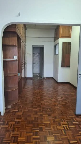 Room features: parquet wood flooring, wooden built-in shelving, white painted walls, doorway leading to another room, window with natural light, neutral wall color, decorative wall panel, arched doorway; style: modern.