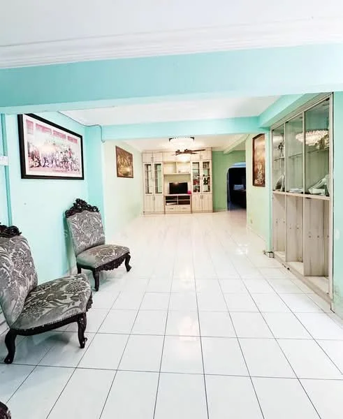 Living features: light blue painted walls, white ceiling, glossy white tile flooring, two ornate armchairs with floral upholstery, built-in cabinetry with glass doors, wall-mounted TV, decorative artwork on walls, recessed ceiling lights; style: modern.