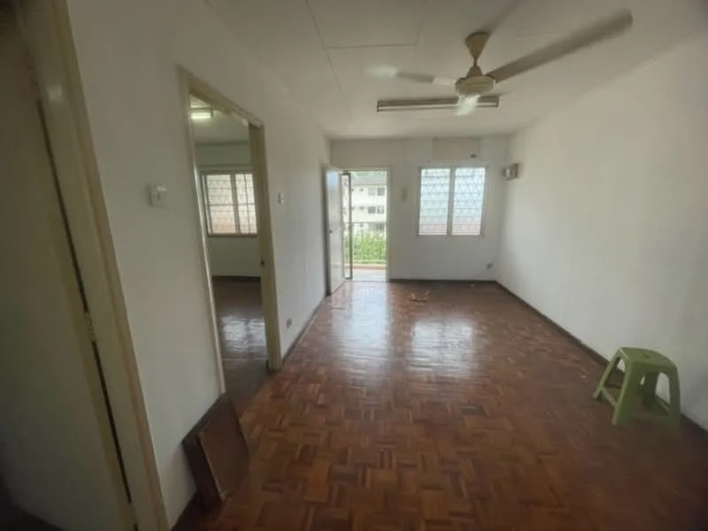 Room features: wooden flooring, white painted walls, ceiling fan, window with grille, air conditioning unit, door leading to balcony, natural light from windows, open layout.