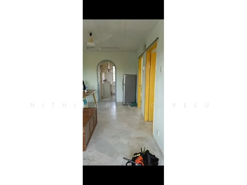 Room features: light green painted walls, white ceiling, marble flooring, ceiling fan, refrigerator, wooden furniture, arched doorway, yellow doors.