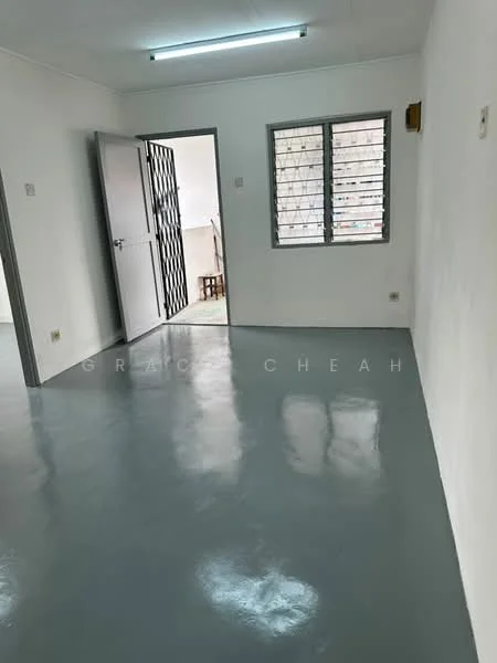 Room features: grey polished flooring, white painted walls, metal security door, sliding window with metal grille, ceiling light fixture.