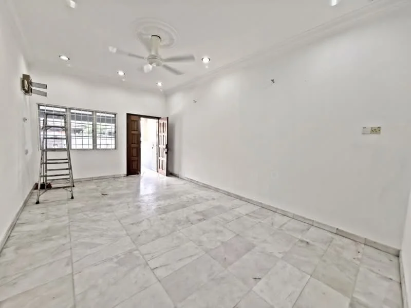 Room features: white painted walls, marble flooring, recessed downlights, 5-blade ceiling fan, window with grille, double-door wooden entrance, staircase, door frame, no visible furniture or decor; style: minimalist.