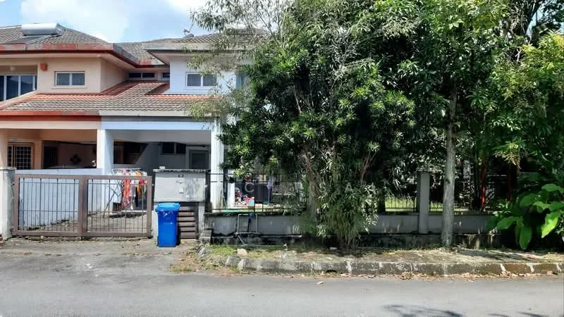 Exterior type: semi-detached house; features: white painted facade, red tiled roof, manicured lawn, mature trees, fenced yard, driveway with interlocking pavers, blue recycling bin, front porch, garden area; style: modern.