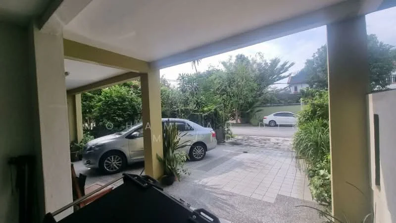 Exterior features: paved driveway, landscaped garden, mature trees, greenery, car parked, open-air parking, surrounded by foliage; style: modern.