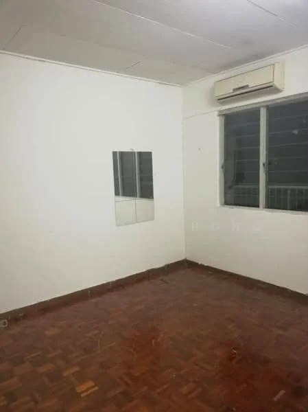 Room features: white painted walls, wooden flooring, window with metal grille, wall-mounted air conditioning unit, mirror on wall.