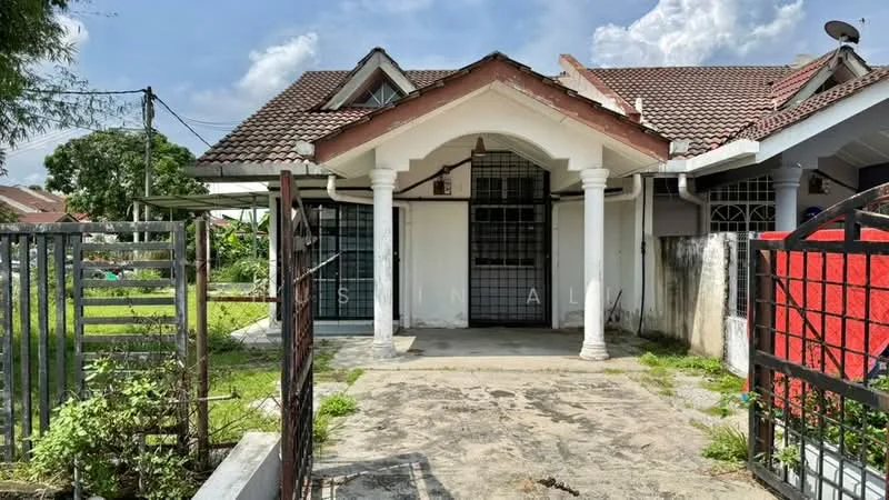 Exterior type: semi-detached house; features: red tiled roof, white painted facade, front porch with concrete flooring, two columns at entrance, metal gate, fenced yard, manicured lawn, garden area, visible landscaping, single-storey, gravel driveway; style: traditional.